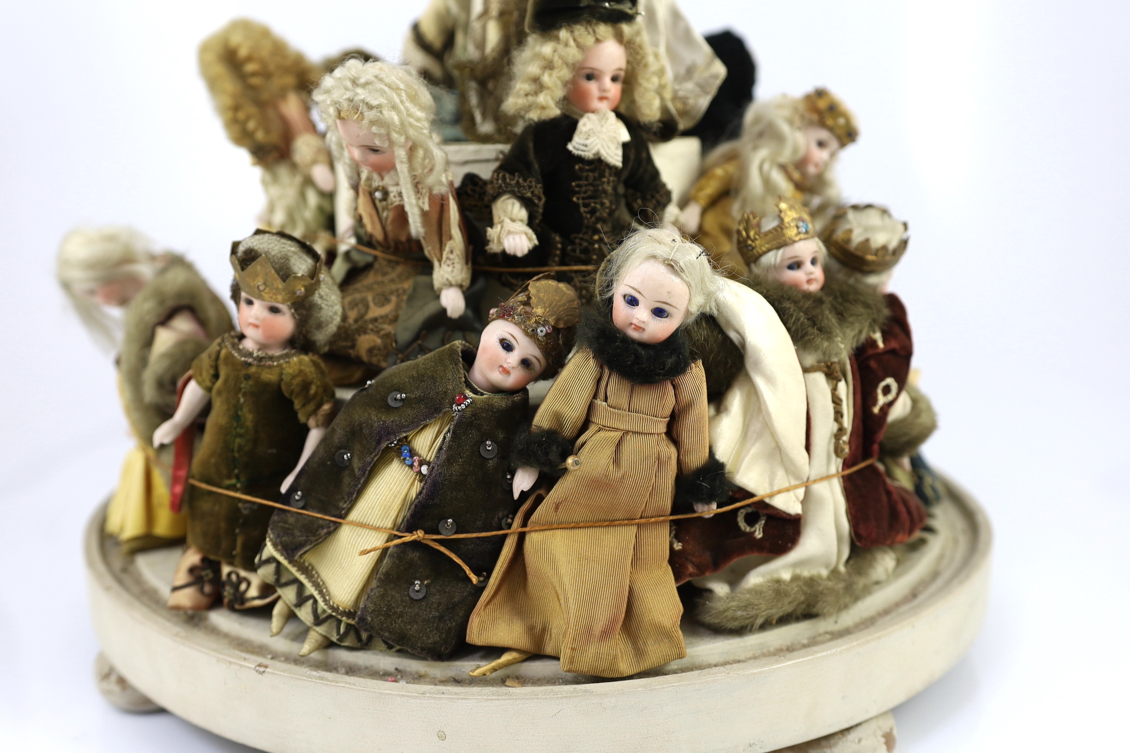 A rare collection of twenty-three German all-bisque dolls, circa 1910